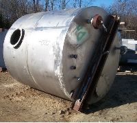Stainless Steel Tanks: Used 3000 gallon stainless steel vertical slope bottom mixing tank