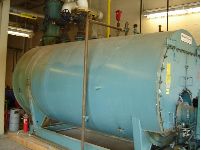 Cleaver Brook Boiler: Used oil or gas Cleaver Brooks CB Packaged firetube HW Boiler. Model CB/200250125, 8.4 million BTU