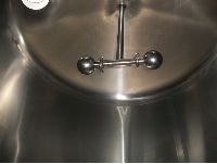 Stainless Steel Tanks: Used 1000 gallon insulated stainless steel tank, convex bottom with agitation