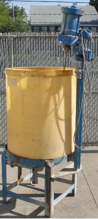 Poly Tanks: Used 95 gallon vertical dish bottom poly mixing tank with explosion proof motor